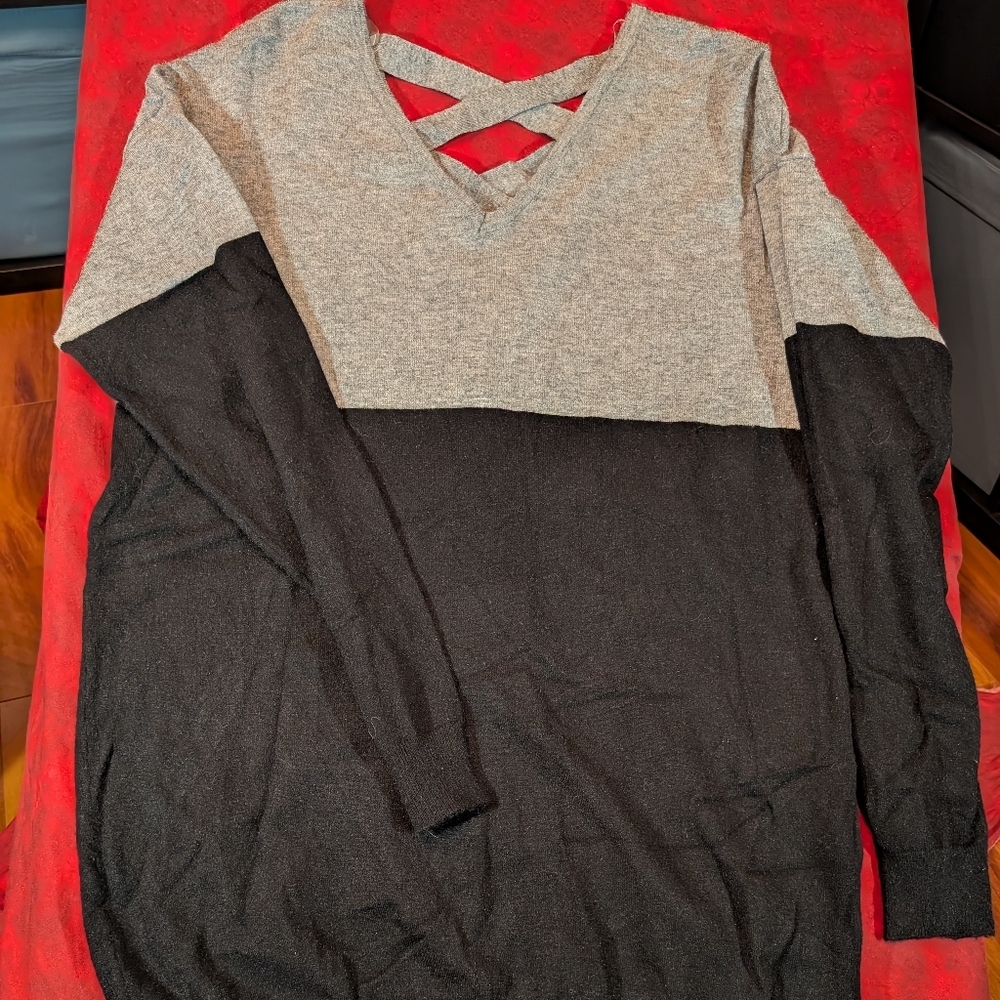 Woman"s Black and Gray V-Neck Sweater